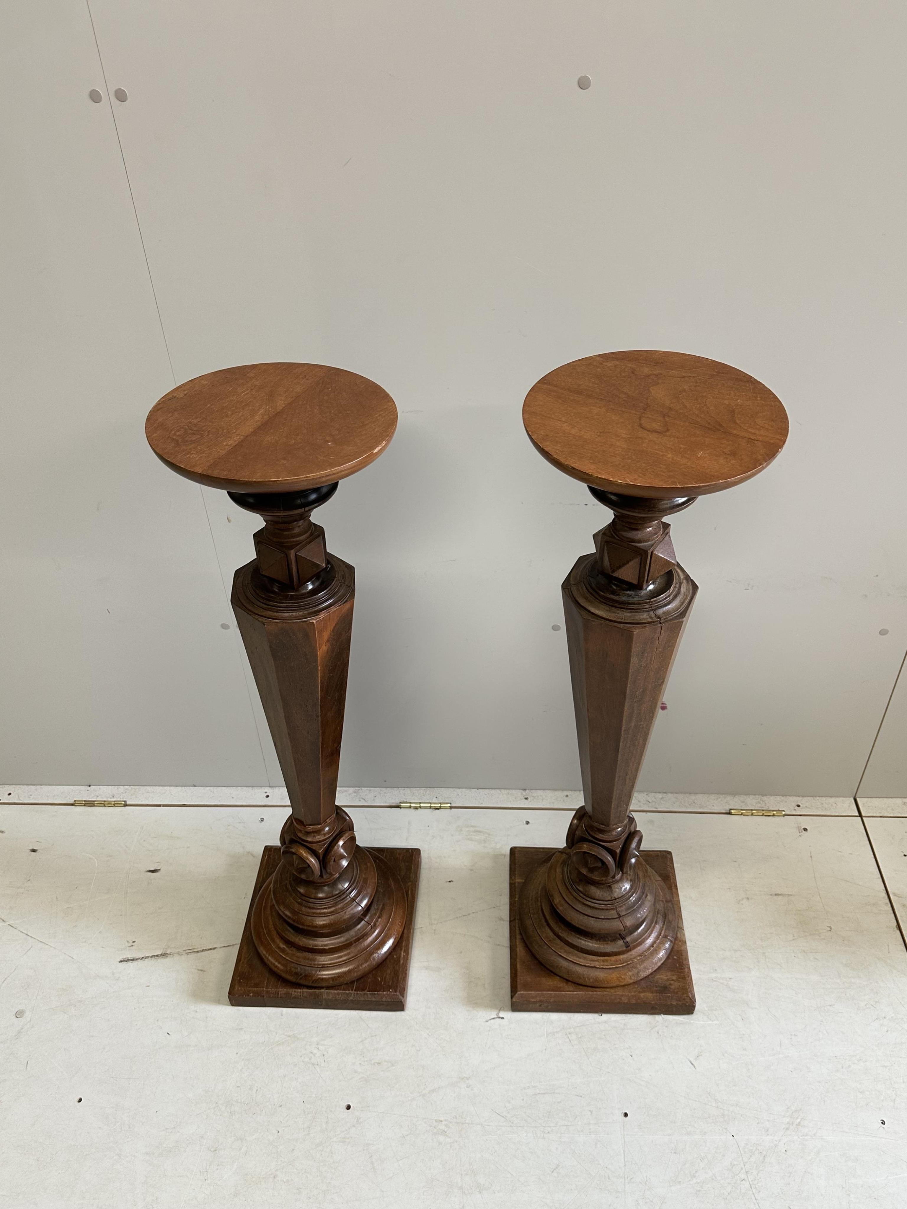 A pair of Victorian and later mahogany pedestals, height 107cm. Condition - fair